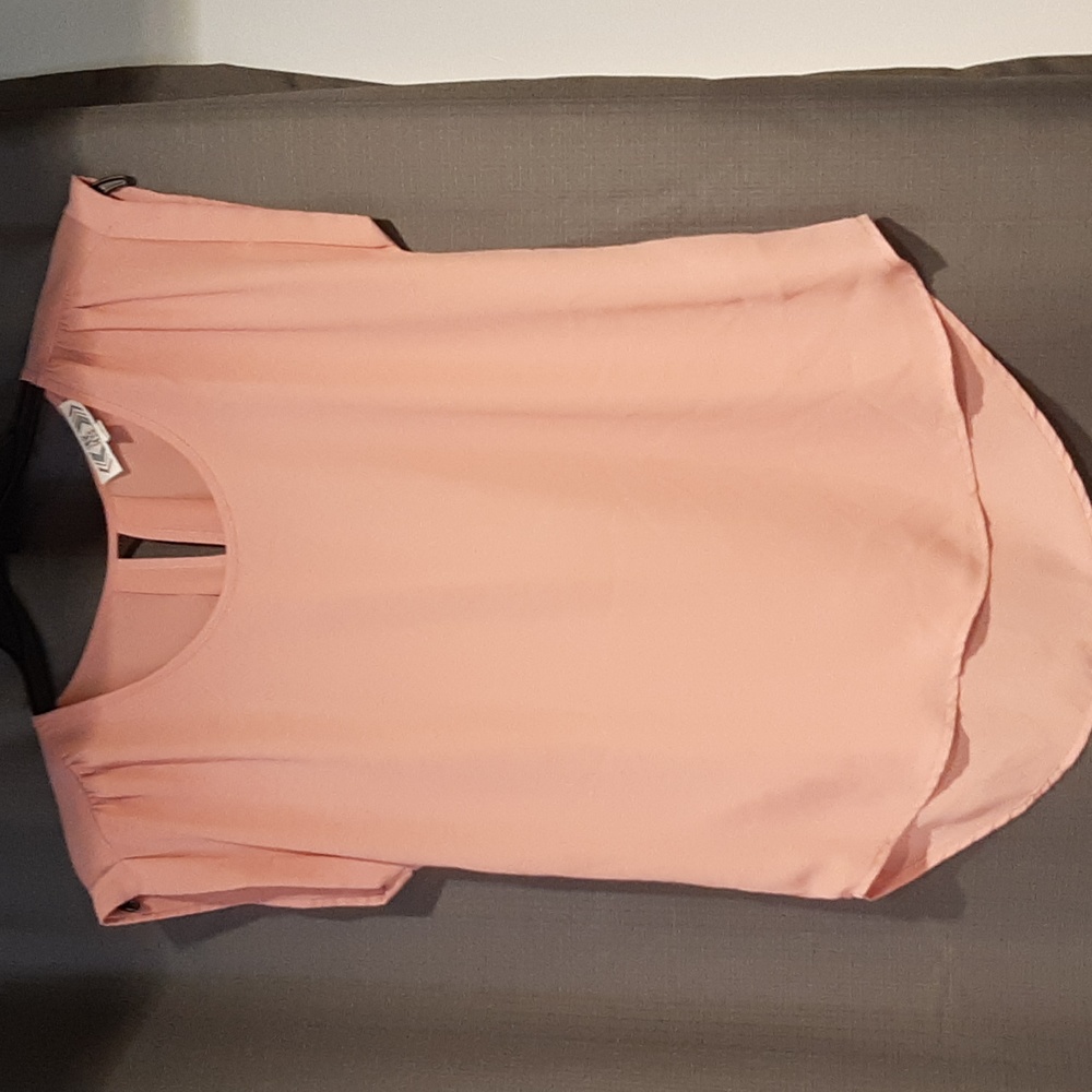 Blush pink colored top